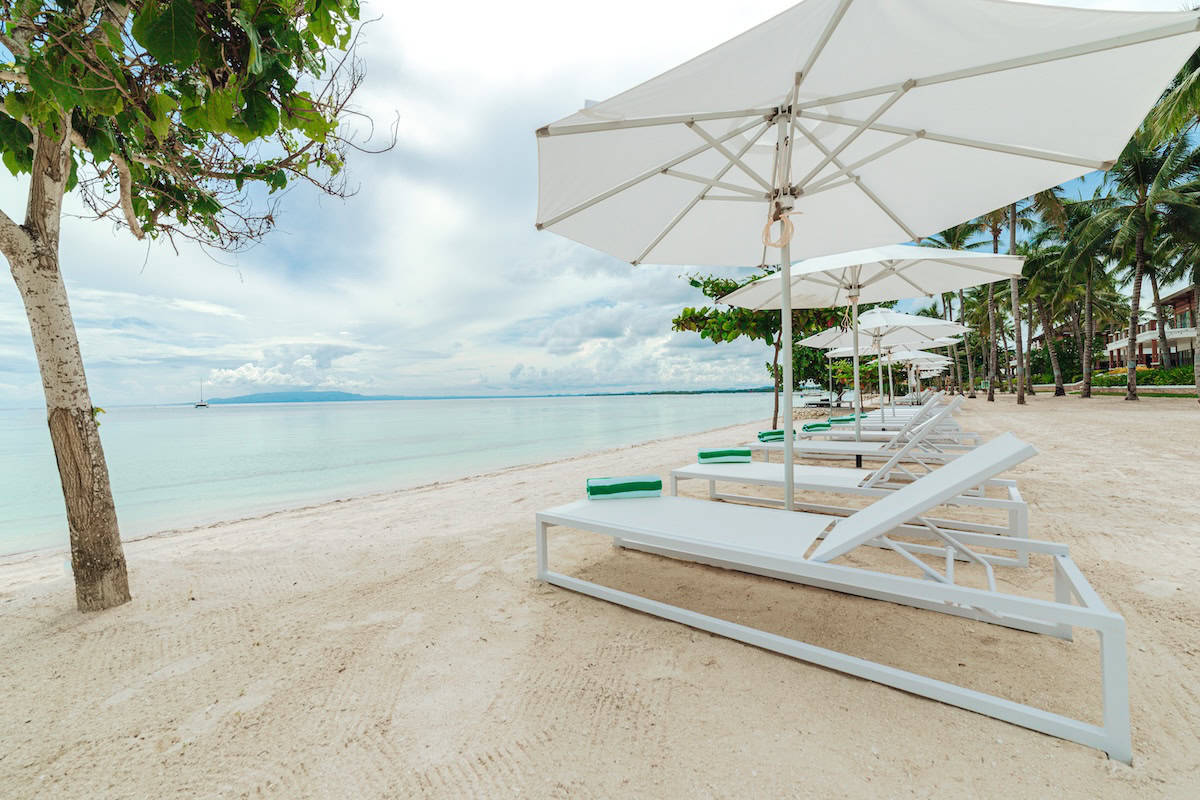 Modala Beach Resort Beach Lounge Chairs on the beach